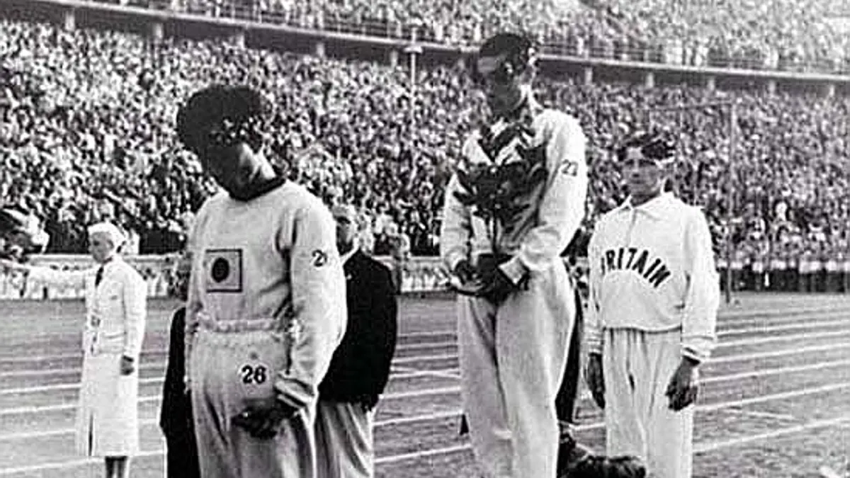 孫基禎在1936年柏林奧運奪得金牌時,以月桂樹遮住日本國旗(圖/取自tistory) 孫基禎在1936年柏林奧運奪得金牌時,以月桂樹遮住日本國旗(圖/取自tistory)