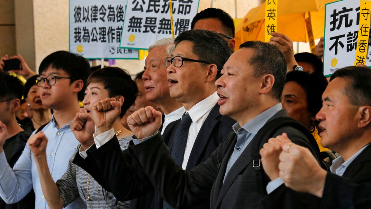 香港的佔領中環案9日上午宣判,運動發起人戴耀廷、陳健民、朱耀明等9人皆被認定觸犯煽惑他人犯公眾妨擾等罪。(美聯社) 香港的佔領中環案9日上午宣判,運動發起人戴耀廷、陳健民、朱耀明等9人皆被認定觸犯煽惑他人犯公眾妨擾等罪。(美聯社)