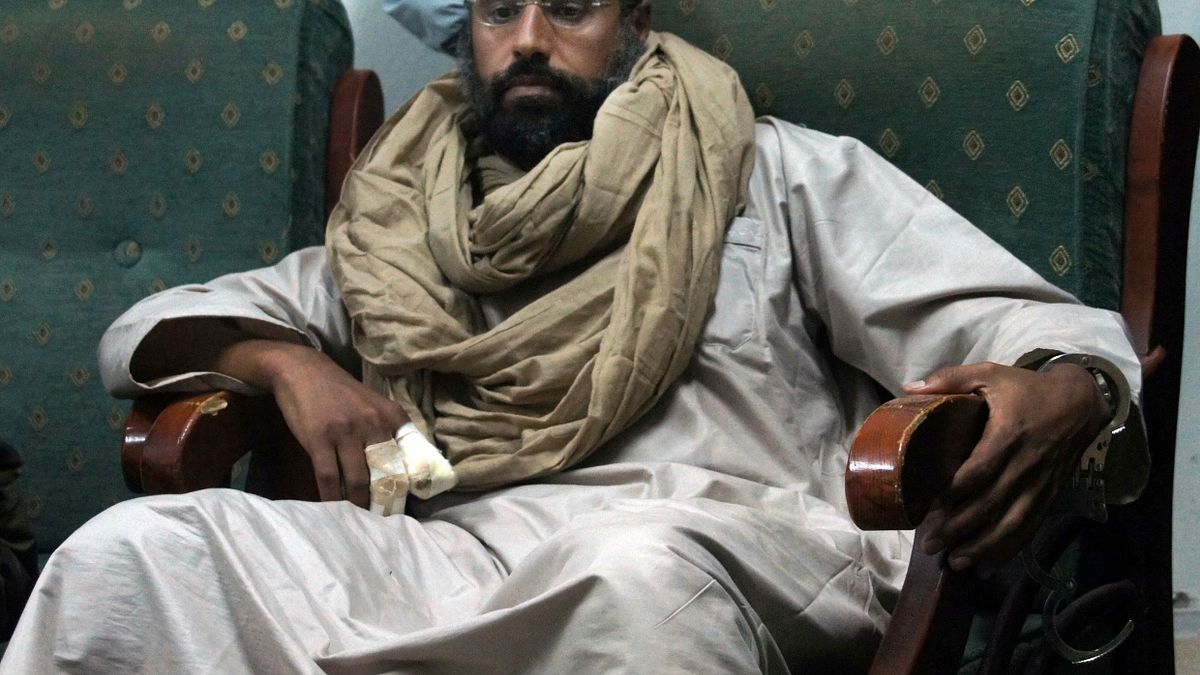 賽義夫‧格達費被捕後。(美聯社) 賽義夫‧格達費被捕後。(美聯社)