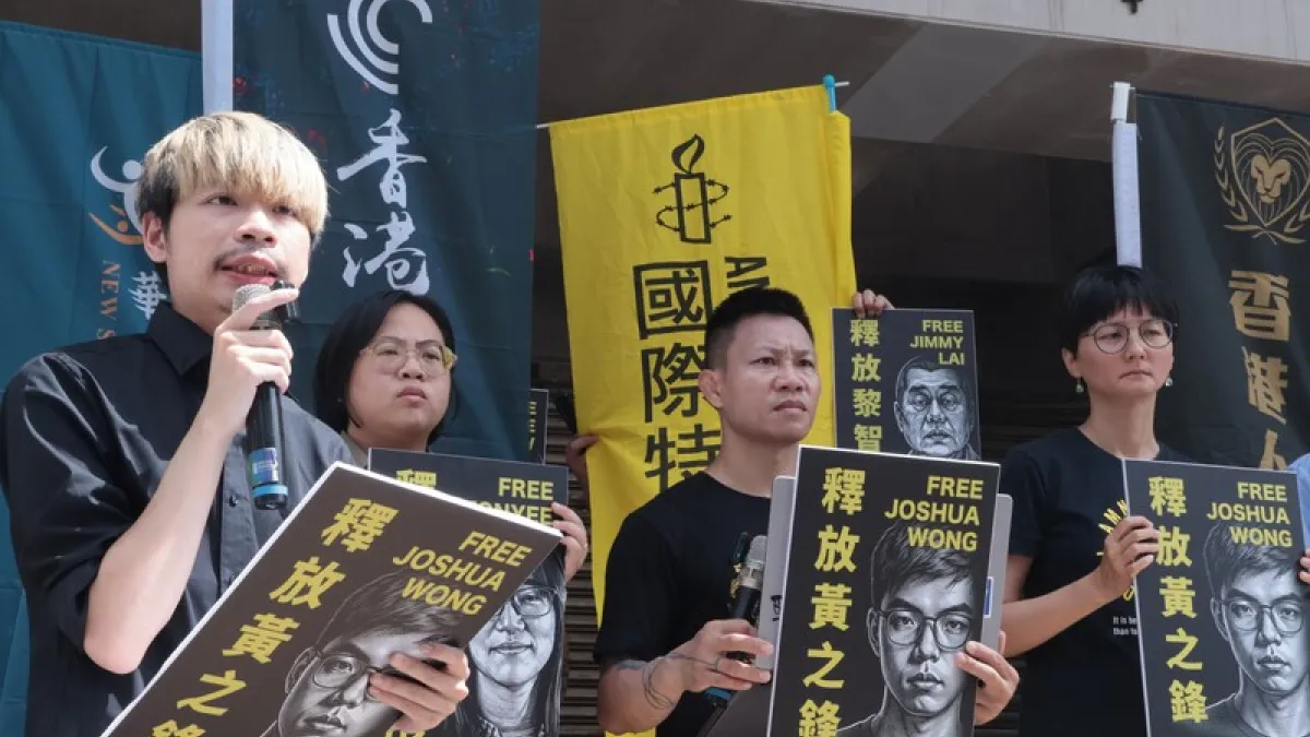 Members of several Taiwanese civil society groups rally outside the Legislative Yuan in Taipei on September 2, calling for the national security charge against Hong Kong activist Joshua Wong to be dropped.