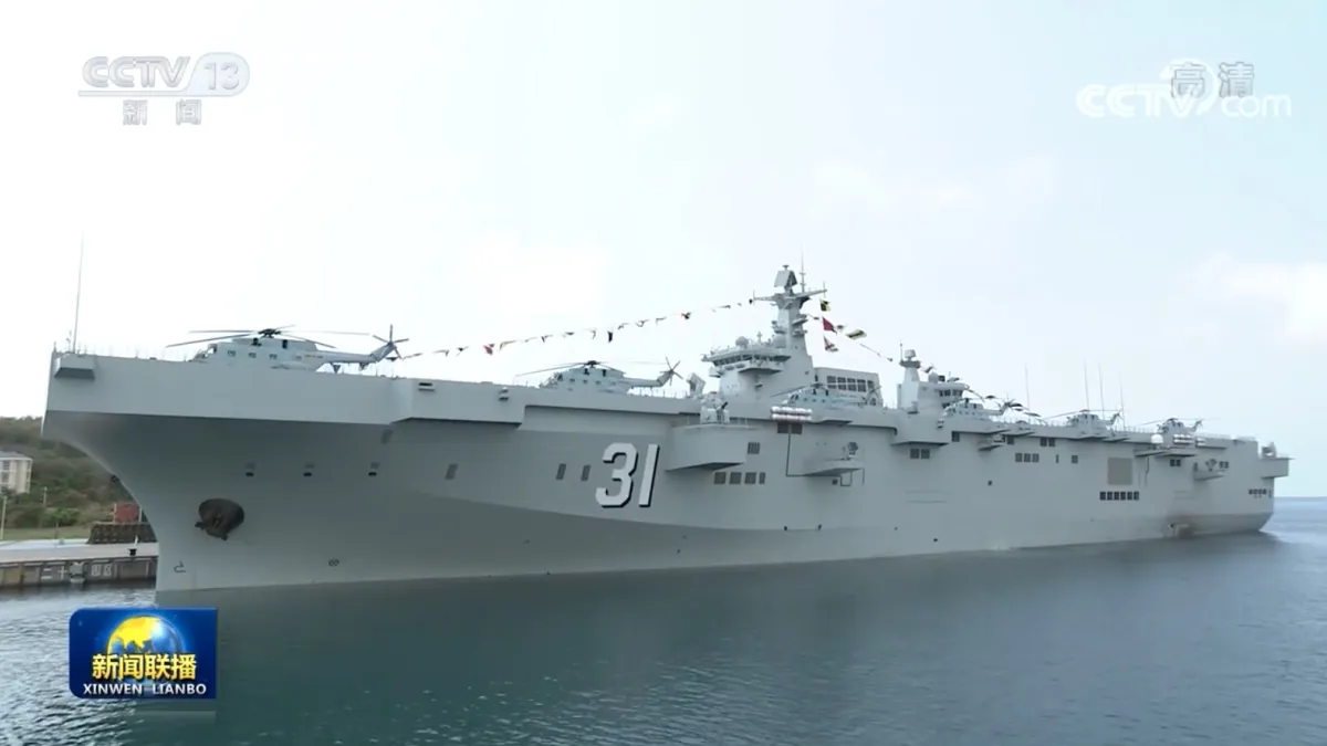 The Type 075 amphibious assault ship Hainan, hull number 31, at its commissioning ceremony in Sanya on April 23, 2021. (Screen capture from CCTV)