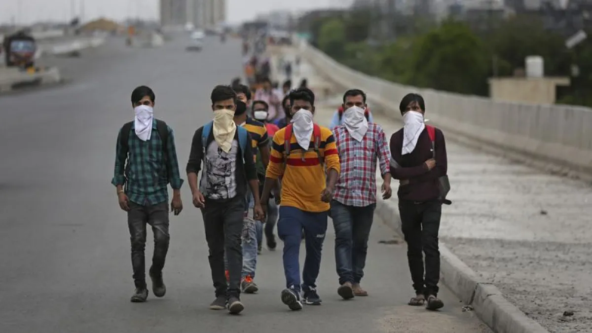 During the COVID-19 crisis, India imposed a nationwide lockdown, forcing many migrant workers to travel hundreds of miles home on foot. (AP)