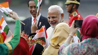 2018年5年30日,印尼雅加達,印度總理莫迪(中)及印尼總統佐科維(美聯社)