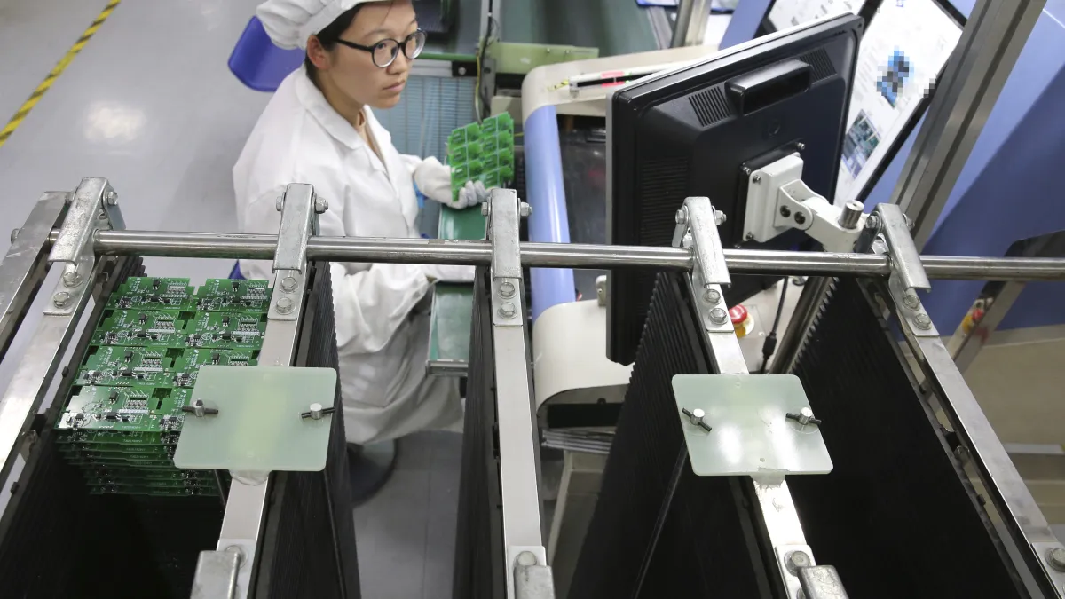 新冠肺炎疫情衝擊全球產業鏈(資料照,AP)