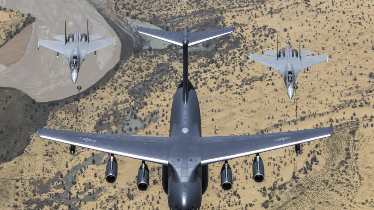A Chinese Air Force Y-20 aerial tanker refuels a J-16 fighter jet. Anthropic's report found Chinese military-linked users tapping its Claude models for electronic warfare and weapons development work. (China Military Online)