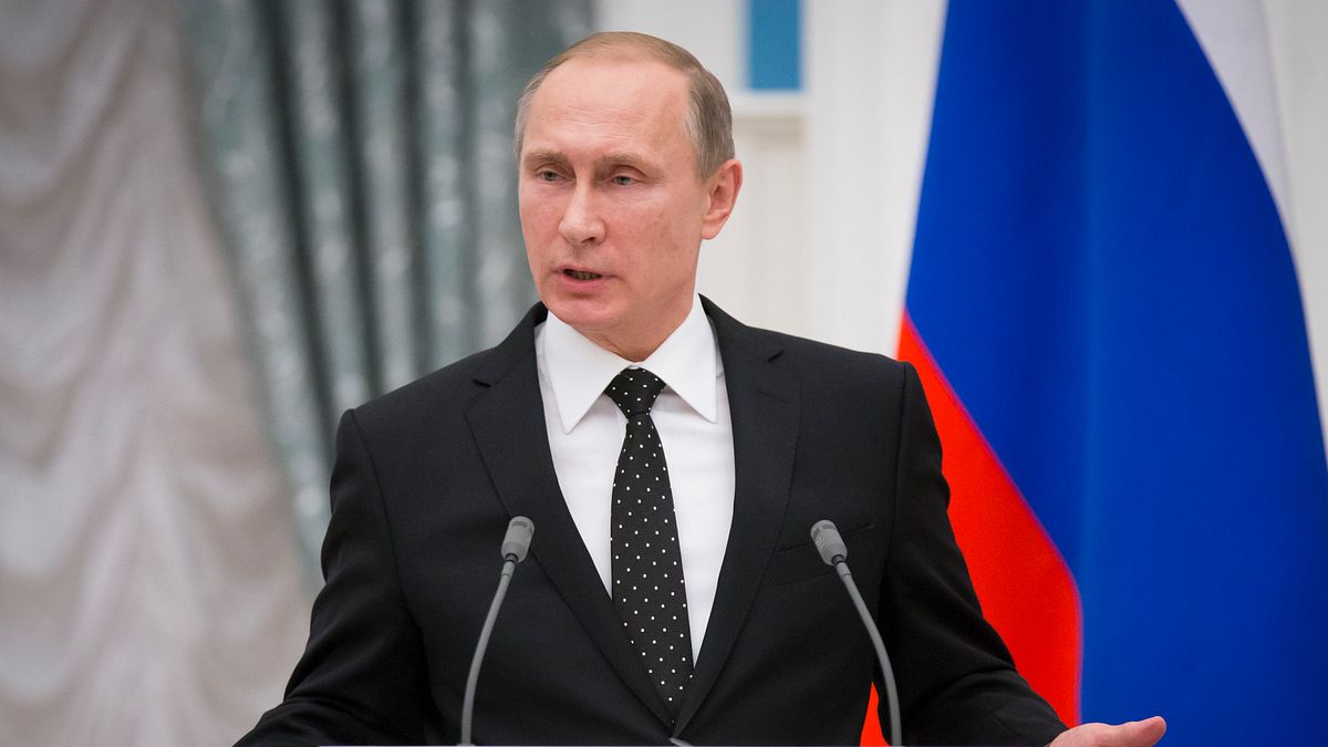 與奧朗德會談過後,普京參加聯合記者會。(美聯社) 與奧朗德會談過後,普京參加聯合記者會。(美聯社)