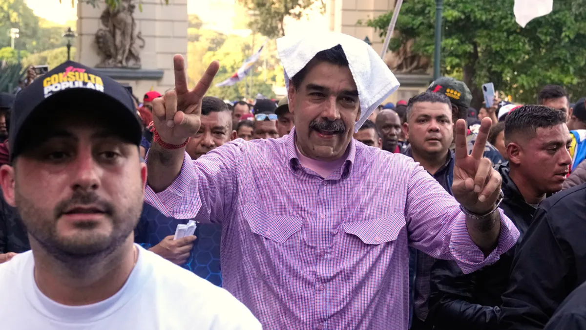 委內瑞拉總統馬杜洛親自證實曾與美國總統川普通過電話。(資料照,美聯社) 委內瑞拉總統馬杜洛親自證實曾與美國總統川普通過電話。(資料照,美聯社)