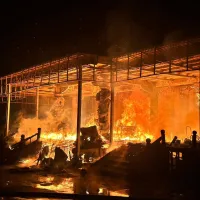 Flames tear through Lingxiao Hall's interior on the night of August 24, exposing the hall's timber roof structure and engulfing its carved dragon pillar. (Threads/@bahu_.bbbbb) Flames tear through Lingxiao Hall's interior on the night of August 24, exposing the hall's timber roof structure and engulfing its carved dragon pillar. (Threads/@bahu_.bbbbb)