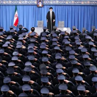 On February 8, 2020, Iran's Supreme Leader Khamenei receives salutes from air force and air defense units in Tehran, with a portrait of Khomeini hanging on the podium. (AP) On February 8, 2020, Iran's Supreme Leader Khamenei receives salutes from air force and air defense units in Tehran, with a portrait of Khomeini hanging on the podium. (AP)