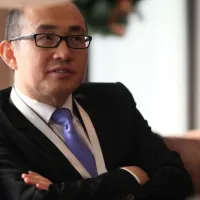 2012年12月、米国の「駐中国大使投資フォーラム」に参加したSOHO中国会長の潘石屹氏(在中国米国大使館提供写真) 2012年12月、米国の「駐中国大使投資フォーラム」に参加したSOHO中国会長の潘石屹氏(在中国米国大使館提供写真)