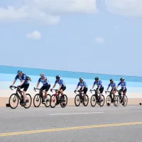 ANZCham riders in matching blue-and-white jerseys cycle along a coastal road in Penghu during the final leg of the five-day, 517-kilometre charity ride. (Photo: ANZCham Taiwan) ANZCham riders in matching blue-and-white jerseys cycle along a coastal road in Penghu during the final leg of the five-day, 517-kilometre charity ride. (Photo: ANZCham Taiwan)