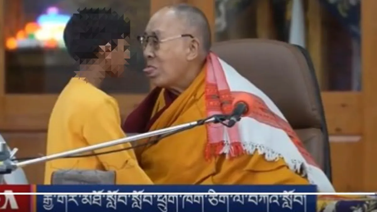 達賴喇嘛日前對男童稱「吸我舌頭」,引爆爭議。(圖/翻攝自推特)