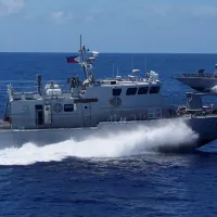 A Philippine Navy vessel takes part in a routine exercise. Analysts say the Taiwan Strait and the South China Sea function as linked but distinct flashpoints in the same regional theater. (Associated Press) A Philippine Navy vessel takes part in a routine exercise. Analysts say the Taiwan Strait and the South China Sea function as linked but distinct flashpoints in the same regional theater. (Associated Press)