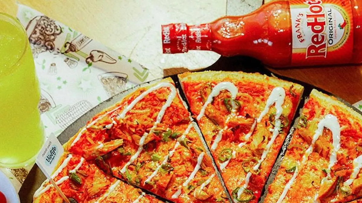 德國必勝客以純素肉、無奶奶酪作為原料,推出一款真正的素食披薩。(圖/取自德國必勝客官網)