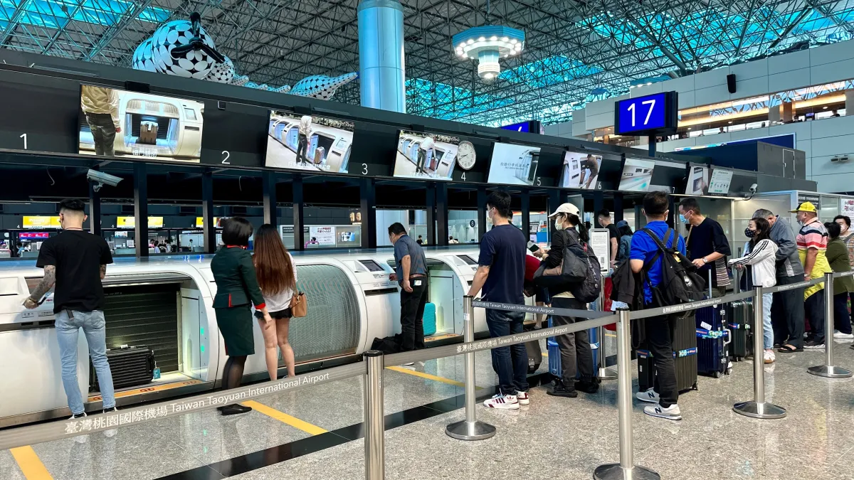 桃園機場旅客報到櫃台。(圖/取自桃園機場官網)