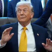 2026年1月14日、ホワイトハウスの大統領執務室で談話を発表するドナルド・トランプ米大統領(AP通信) 2026年1月14日、ホワイトハウスの大統領執務室で談話を発表するドナルド・トランプ米大統領(AP通信)