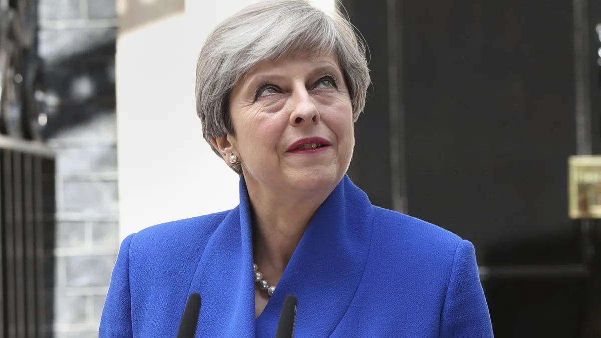 英國首相梅伊試圖透過大選鞏固執政,卻引發政治危機。(美聯社)