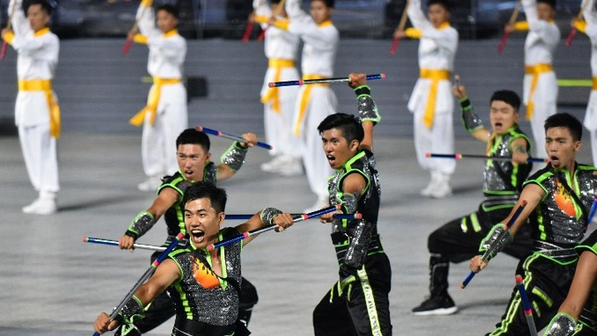 世大運特別邀請曾破紀錄將武術帶到雪梨奧運的太極門近300位弟子,將武俠小說中的七星陣、五行旗陣等重現江湖。(圖/陳又嘉攝) 世大運特別邀請曾破紀錄將武術帶到雪梨奧運的太極門近300位弟子,將武俠小說中的七星陣、五行旗陣等重現江湖。(圖/陳又嘉攝)