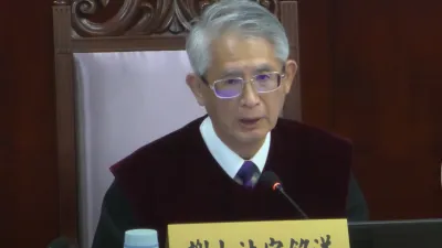 司法院代理院長謝銘洋。(取自司法院YouTube影音)