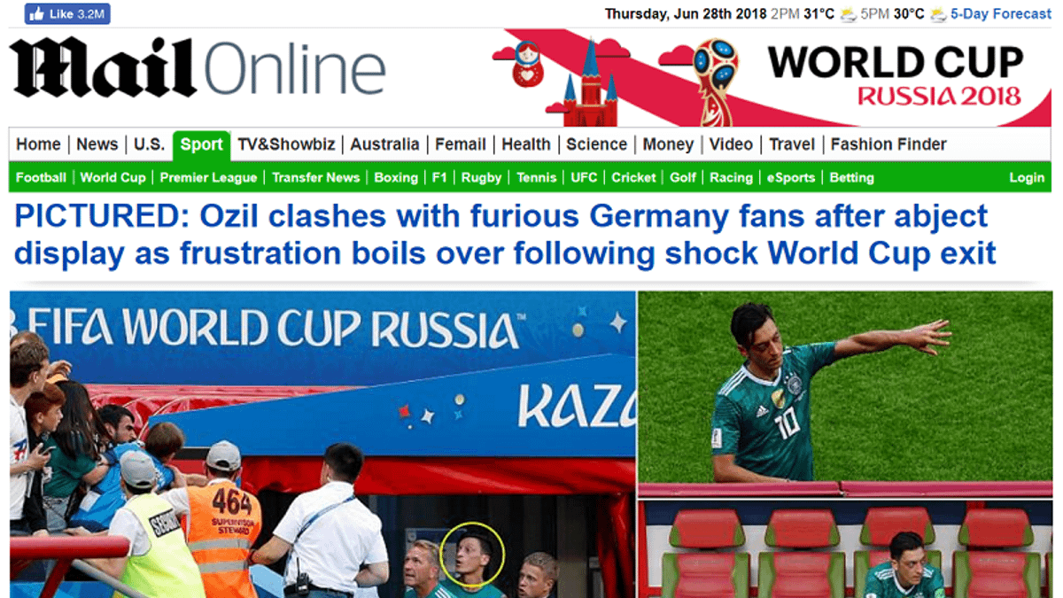 英國《每日郵報》捕捉到德國慘敗賽後,球迷與厄齊爾爆發肢體衝突。(截圖自《每日郵報》網站) 英國《每日郵報》捕捉到德國慘敗賽後,球迷與厄齊爾爆發肢體衝突。(截圖自《每日郵報》網站)