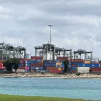 Taiwan faces a deepening crisis in the U.S. Section 301 investigation, driven by its rapidly growing trade surplus with America. Pictured: a cargo port in southern Singapore. Photo by Wu Sheng-hung, Central News Agency, March 16, 2026. Taiwan faces a deepening crisis in the U.S. Section 301 investigation, driven by its rapidly growing trade surplus with America. Pictured: a cargo port in southern Singapore. Photo by Wu Sheng-hung, Central News Agency, March 16, 2026.