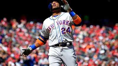 台灣球迷熟悉的卡諾(見圖),穿上大都會球衣首打席就從國民塞揚投手薛澤沒有掉下來的變速球掃出中左外野全壘打牆外。(美聯社)