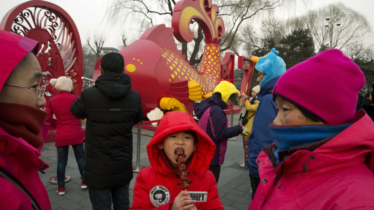 農曆新年意外引發台獨與統戰討論,圖為北京民眾慶祝農曆新年。(美聯社)