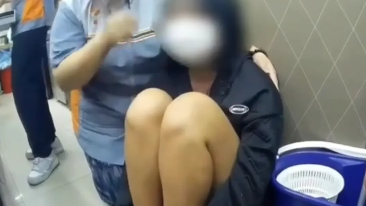 黃姓女大學生在網絡交友不慎遭詐騙威脅而躲進超商求救。(圖/翻攝自記者爆料網)