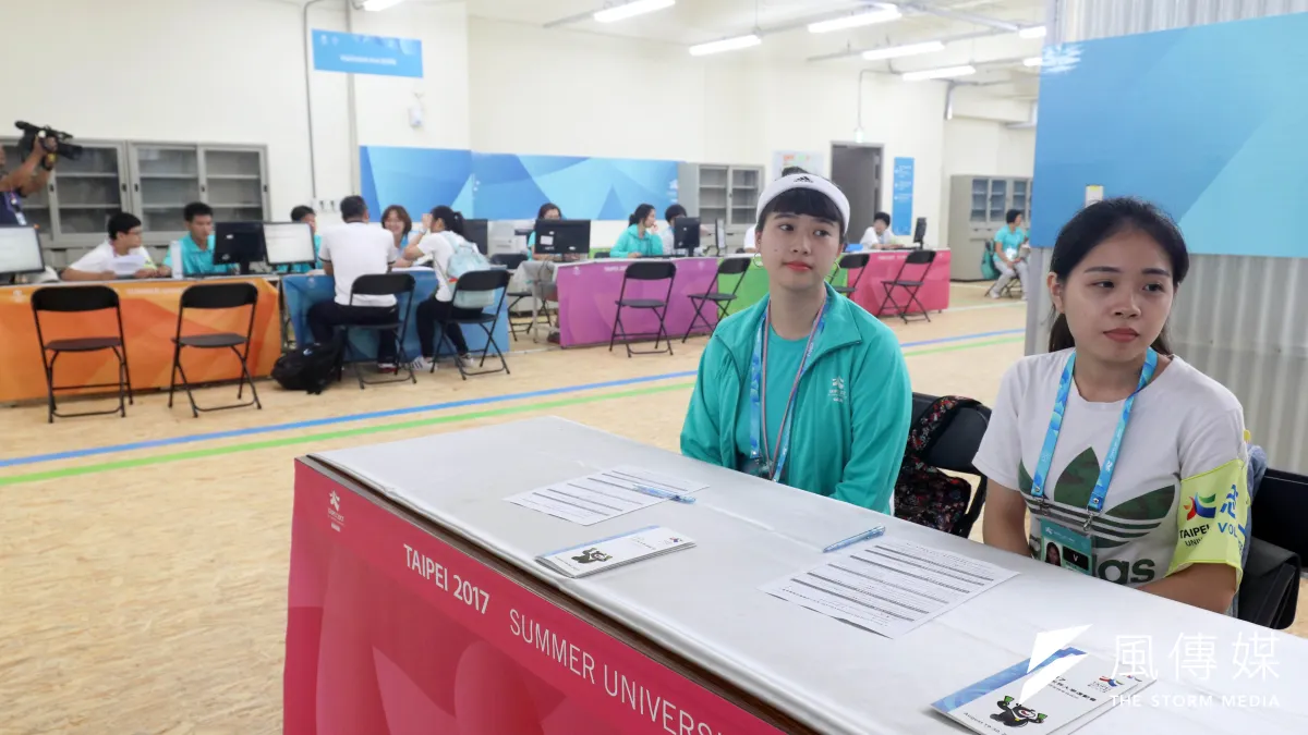 市議員李慶鋒7日下午發現,透過台北市府的志工管理整合平台竟能看到駐選手村志工的手機號碼和身分證字號。圖為選手村內的接待和註冊中心。(資料照,蘇仲泓攝)