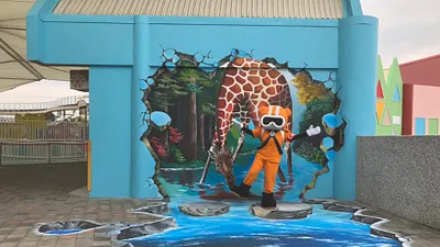 台北市立兒童新樂園推出豬年春節活動,園區內還有最新的3D立體彩繪背景,打造拍照打卡聖地!(台北市政府提供)