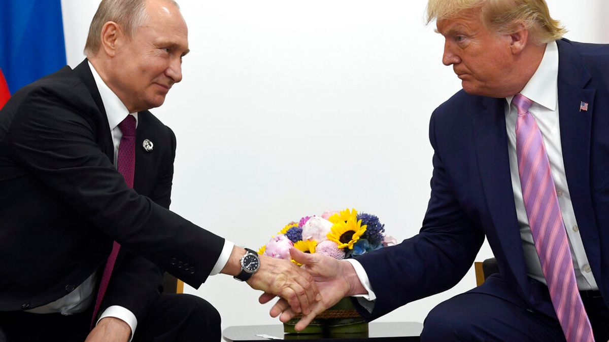 川普與普京。(美聯社) 川普與普京。(美聯社)