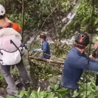 The Butterfly Valley incident left four dead and one injured. Pictured: rescue personnel using ropes to pull a victim with no signs of life up to the road. (CNA) The Butterfly Valley incident left four dead and one injured. Pictured: rescue personnel using ropes to pull a victim with no signs of life up to the road. (CNA)