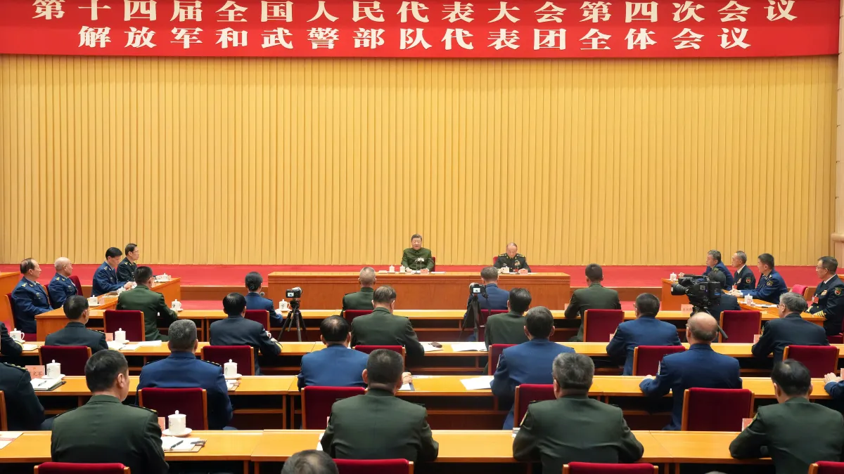 During the plenary session of the People's Liberation Army and Armed Police Forces delegation at the Fourth Session of the 14th National People's Congress on March 7, only Chinese President Xi Jinping (left) and Central Military Commission Vice Chairman Z