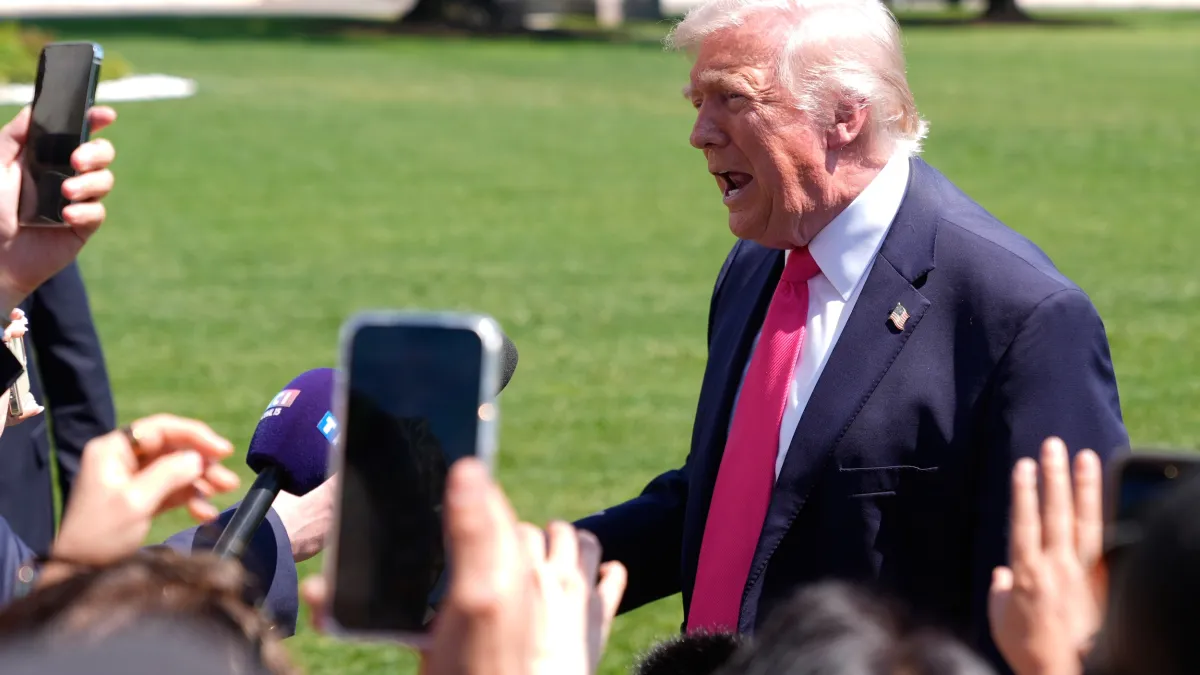 U.S. President Trump speaks with reporters on the South Lawn of the White House before boarding Marine One, April 16, 2026. (AP)