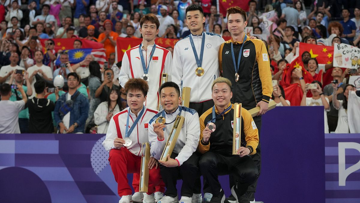 「麟洋配」奪下巴黎奧運羽球男雙金牌,台灣各地一片狂喜,反映出兩岸更深的地緣政治分歧。(美聯社) 「麟洋配」奪下巴黎奧運羽球男雙金牌,台灣各地一片狂喜,反映出兩岸更深的地緣政治分歧。(美聯社)