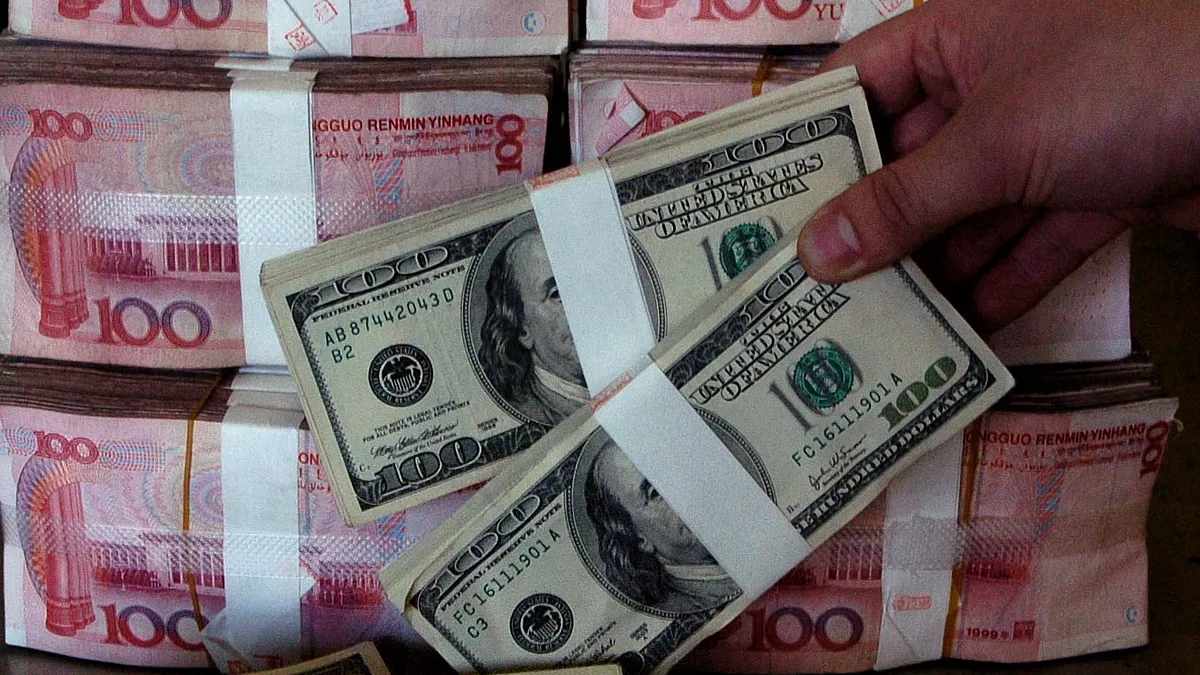 人民幣已連續10個交易日貶值。(資料照片,新華社) 人民幣已連續10個交易日貶值。(資料照片,新華社)