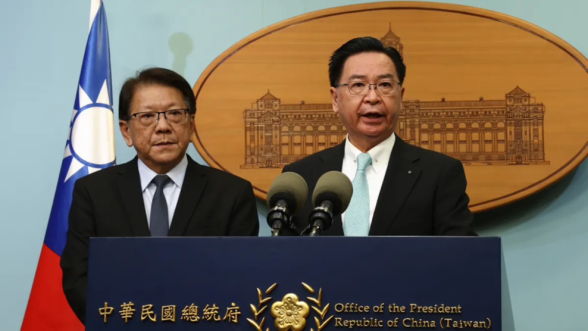 National Security Council Secretary-General Wu Chao-hsieh (right) and Presidential Office Secretary-General Pan Meng-an hold a press conference to explain the suspension of President Lai's overseas visit. Wu stated that Seychelles, Mauritius, and Madagasc