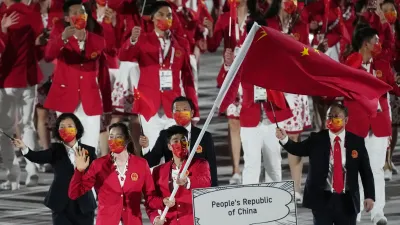 2021年7月23日,中國隊出席日本東京奧運開幕式(AP)