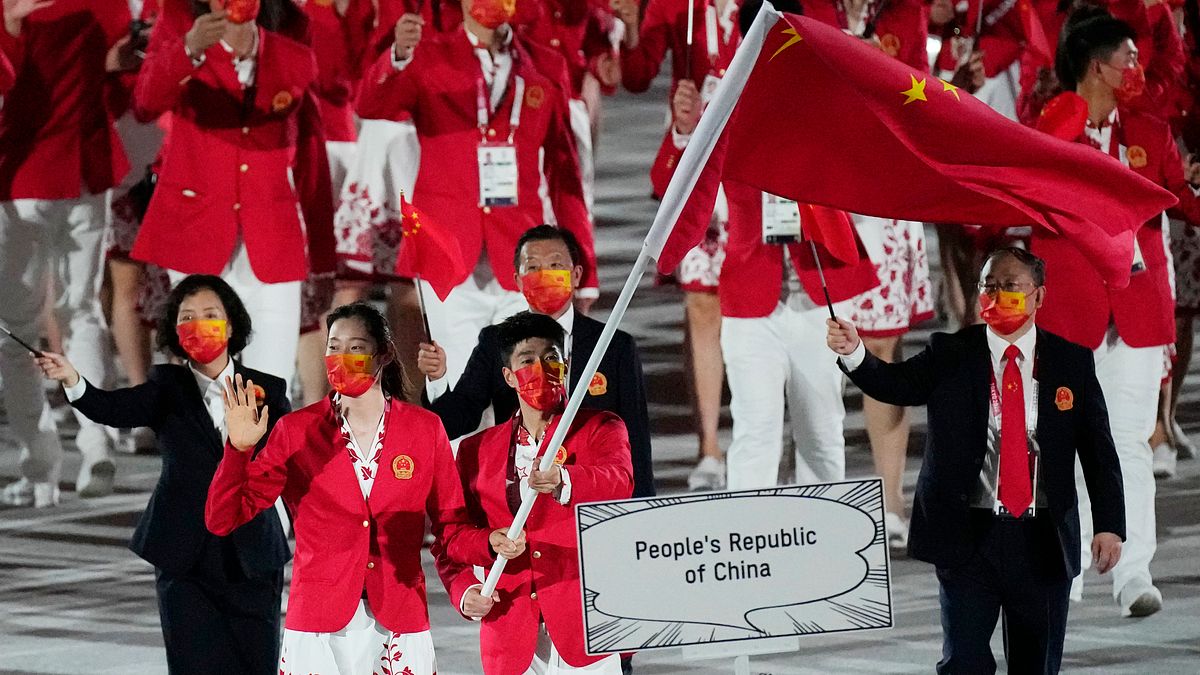 2021年7月23日,中國隊出席日本東京奧運開幕式(AP) 2021年7月23日,中國隊出席日本東京奧運開幕式(AP)