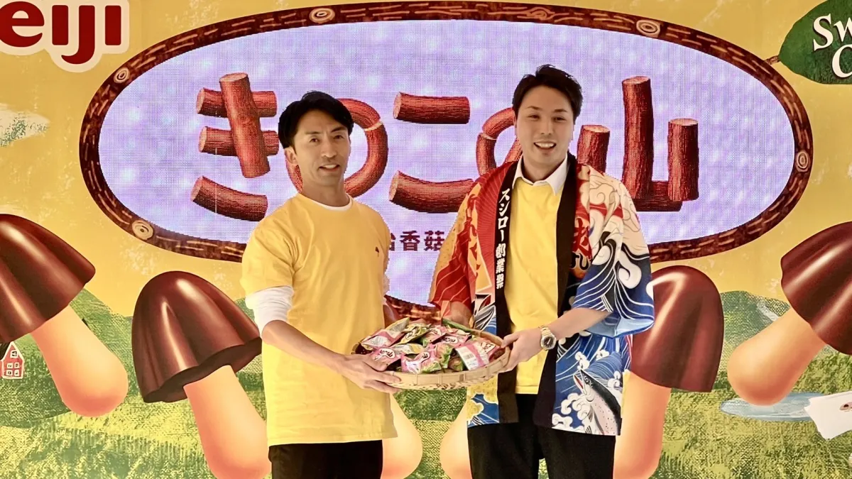 台灣明治副總經理下田將人(左)與台灣壽司郎總經理合影。(圖/台灣明治提供)