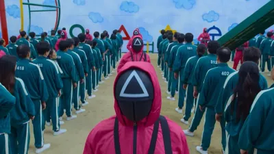 Netflix《魷魚遊戲》講述456人為了爭奪456億韓元獎金,參加了神祕生存實境電視節目的故事。(圖/取自IMDb官網)