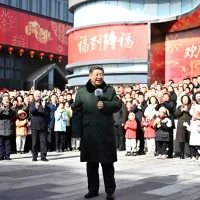 Chinese President Xi Jinping interacts with citizens in Beijing's Dongcheng district. (AP) Chinese President Xi Jinping interacts with citizens in Beijing's Dongcheng district. (AP)