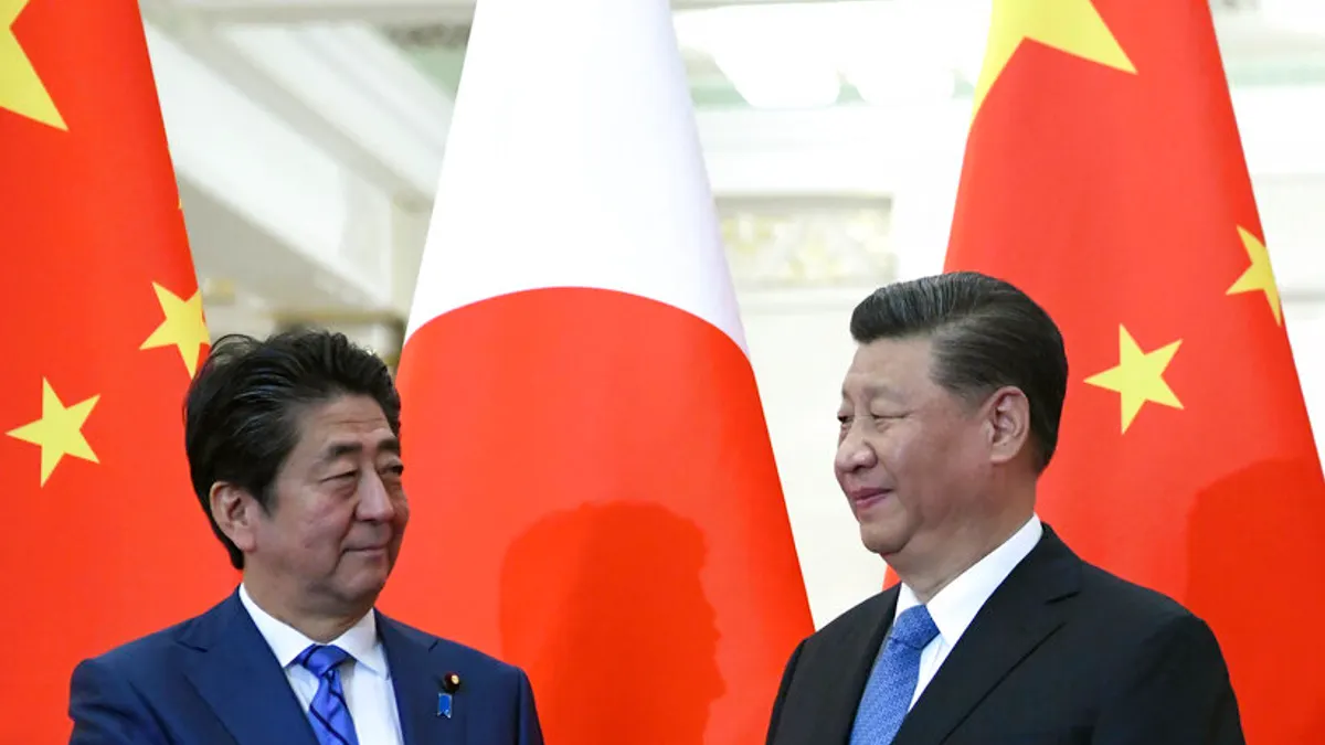 安倍晉三在回憶錄中提到,習近平曾提到若生在美國,他不會加入美國共產黨。(資料照,美聯社)