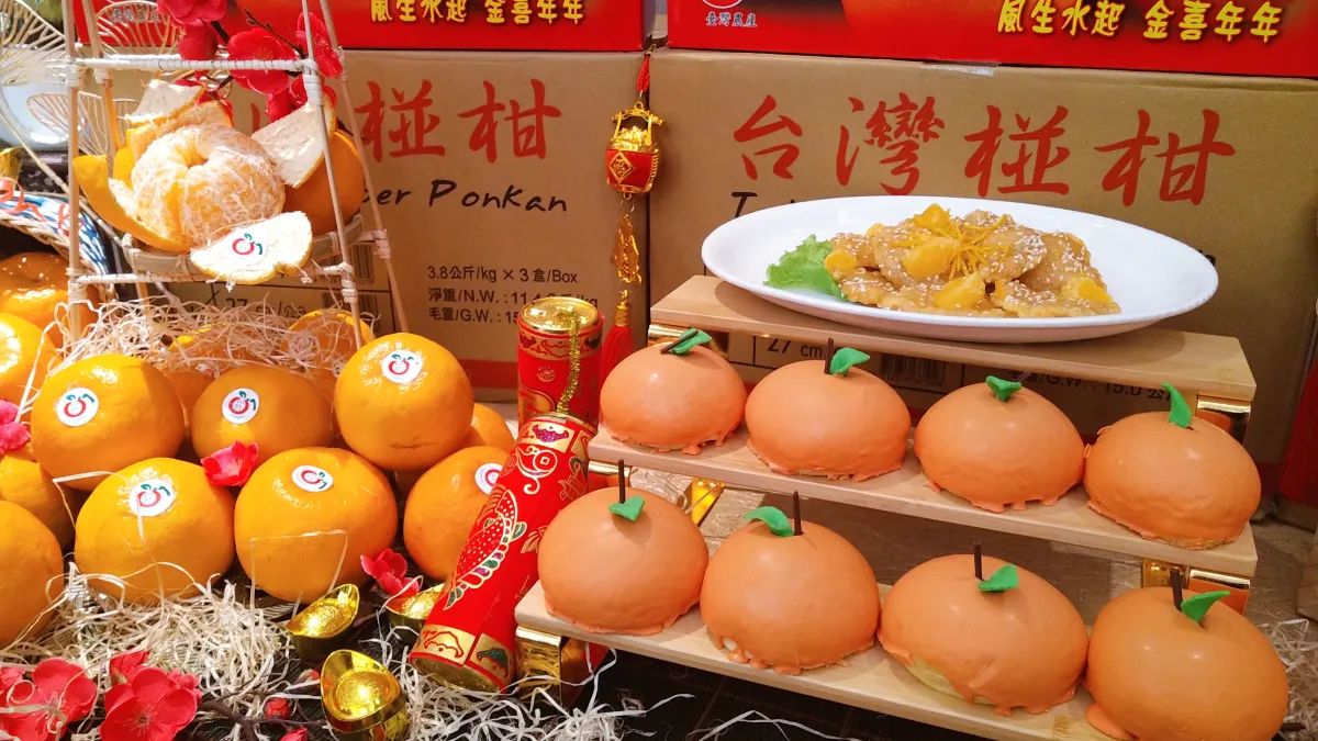 台中市府農業局透過異業合作多元行銷臺中椪柑。(圖/台中市政府)