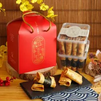 臺南「日安良食」推出「鳳凰尊爵禮盒」,主打酥脆扎實的「鳳凰卷」產品,口味可自由搭配。(圖/勞動力發展署雲嘉南分署提供) 臺南「日安良食」推出「鳳凰尊爵禮盒」,主打酥脆扎實的「鳳凰卷」產品,口味可自由搭配。(圖/勞動力發展署雲嘉南分署提供)