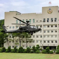 During the Han Kuang exercise on the 10th, Apache helicopters belonging to the Army Aviation and Special Forces Command conducted dispersed deployment operations at the Coast Guard Administration headquarters in Wenshan District, Taipei. (Photo courtesy o During the Han Kuang exercise on the 10th, Apache helicopters belonging to the Army Aviation and Special Forces Command conducted dispersed deployment operations at the Coast Guard Administration headquarters in Wenshan District, Taipei. (Photo courtesy o