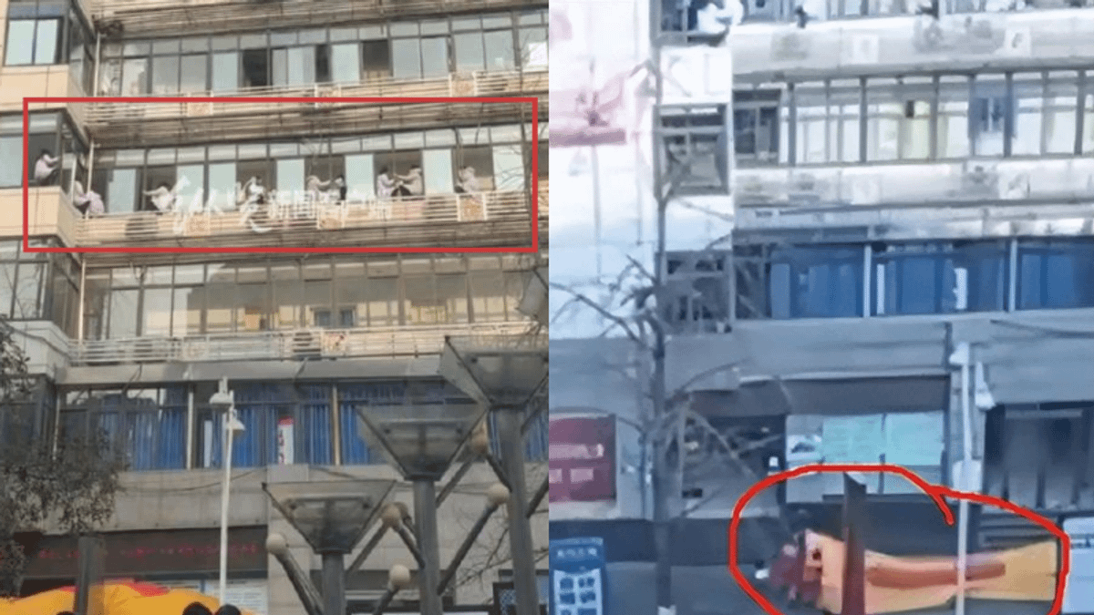 四川一間醫院驚傳醫護人員坐窗邊、作勢跳樓。(圖/翻攝自微博) 四川一間醫院驚傳醫護人員坐窗邊、作勢跳樓。(圖/翻攝自微博)