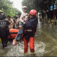 Rescue workers evacuate trapped residents in Qinzhou, Guangxi Zhuang Autonomous Region, China, on July 7, 2026, in the aftermath of Typhoon Merbok (known in China as Meisake). (AP) Rescue workers evacuate trapped residents in Qinzhou, Guangxi Zhuang Autonomous Region, China, on July 7, 2026, in the aftermath of Typhoon Merbok (known in China as Meisake). (AP)
