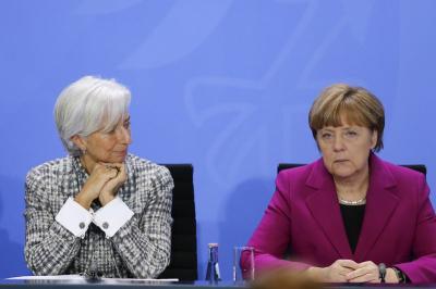 0320150312 Angela Merkel and Christine Lagarde AP