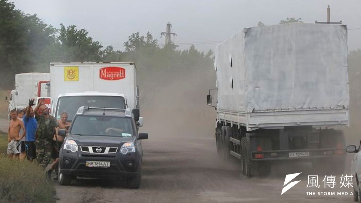 硬闖烏克蘭的俄羅斯車隊(美聯社) 硬闖烏克蘭的俄羅斯車隊(美聯社)